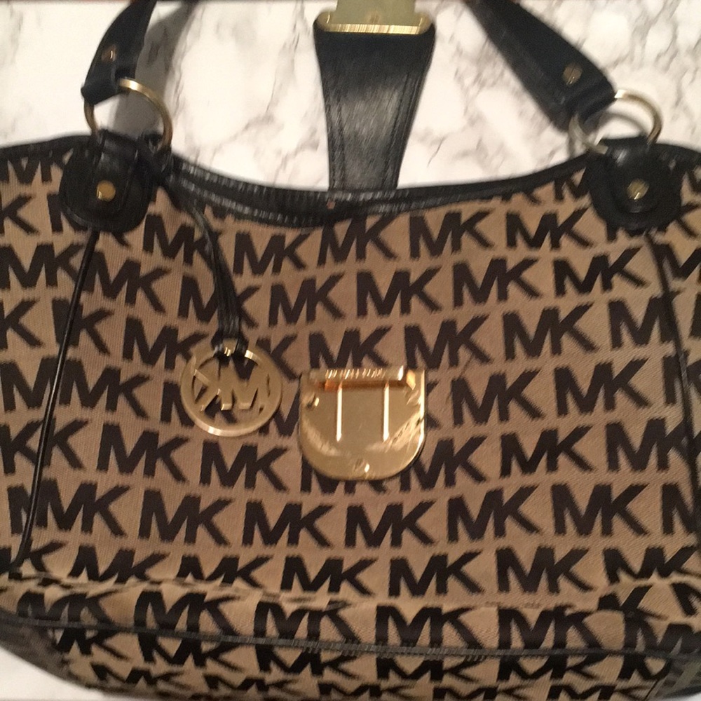 Michael Kors signature bag/pocket